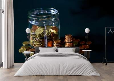 coins piled up on table saving money no people on white background stock images stock photo	 Wall mural