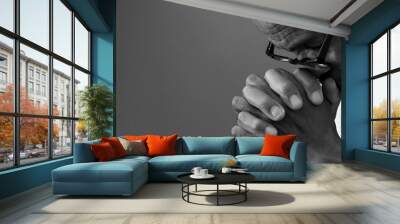 man praying to god with hands together Caribbean man praying on black background with people stock photos stock photo stock image	 Wall mural