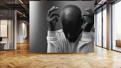 man praying to god with hands together Caribbean man praying with white background stock footage stock photo	 Wall mural