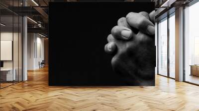 man praying to god with hands together on grey black background stock image stock photo	 Wall mural