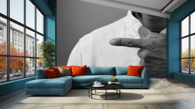 pointing with hand gesture suggesting confidence with people stock photo stock image Wall mural