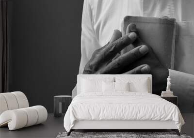 praying to god with hands together on black background with people stock image stock photo	 Wall mural