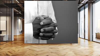 praying to god with hands together on black background with people stock image stock photo	 Wall mural