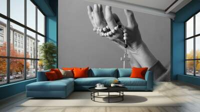 praying to god with hands together on grey background with people stock photo stock image	 Wall mural