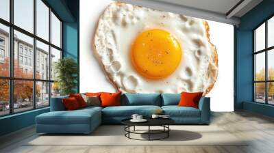 A perfectly cooked fried egg with a runny yolk Wall mural