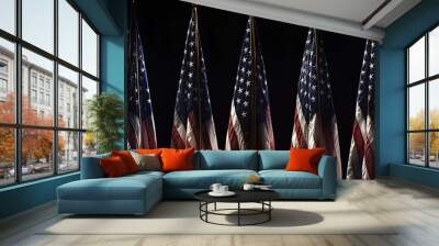 A row of American flags, each flag illuminated by the soft glow from an overhead light Wall mural