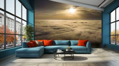 Sunset over the clouds Wall mural