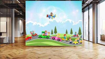 the children are playing with the car and another transportation in the beautiful day  Wall mural