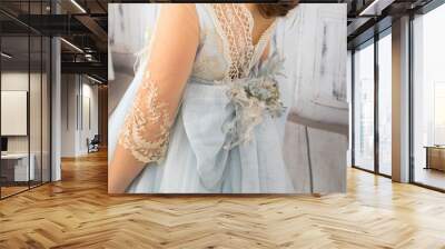 dress and outfit for holy Communion girl with blue flower belt Wall mural