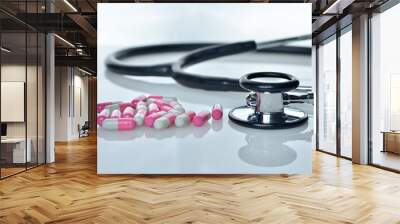 Medical stethoscope and medicine on white Wall mural