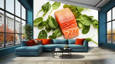 A single piece of salmon with spinach leaves on a white background. Wall mural