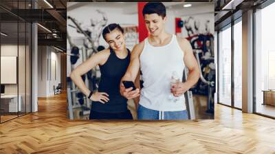 couple in a gym Wall mural