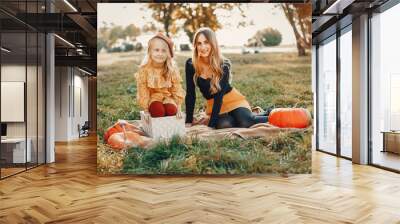 Family with pumpkins Wall mural