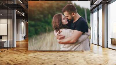 young family with a child have fun outdoors Wall mural