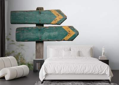 weathered wooden directional signs with turquoise paint against bright sky Wall mural