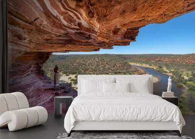 A woman is looking at beautiful gorge of Kalbarri National Park, Western Australia Wall mural