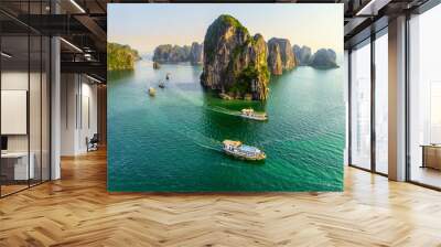 Aerial view floating fishing village and rock island, Halong Bay, Vietnam, Southeast Asia. UNESCO World Heritage Site. Junk boat cruise to Ha Long Bay. Popular landmark, famous destination of Vietnam Wall mural