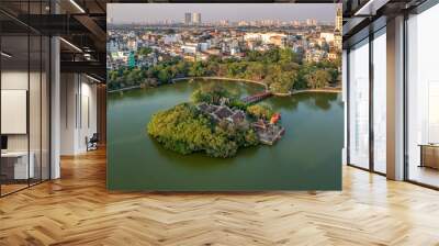 Top view aerial of Ngoc Son temple, Hoan Kiem Lake, Hanoi City with development buildings, transportation, energy power  Wall mural