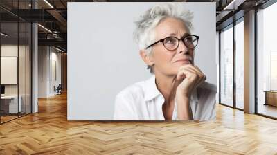 Portrait of a white old female with thinking out loud expression against white background, AI generated, background image Wall mural