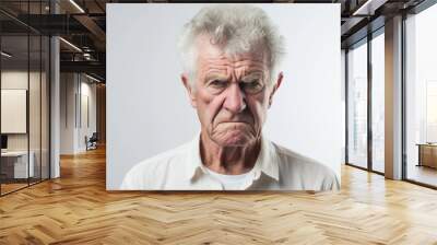 Portrait of a white old male with angry expression against white background with space for text, AI generated, Background image Wall mural