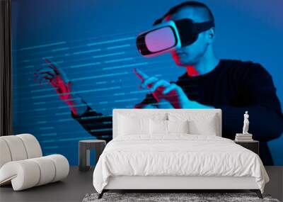 VR, AR, MR, XR-  Future technology. Neon. European man's in VR-glasses in neon on gradient background. Male portrait. Concept of human emotions, facial expression, modern gadgets and technologies Wall mural