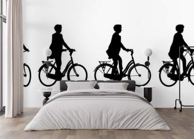 Vector concept or conceptual black silhouette of a woman riding a bicycle from different perspectives isolated on white background. A metaphor for health, fitness, work, leisure and lifestyle Wall mural