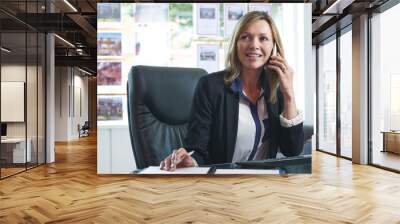 Estate Agent On Phone In Office Wall mural