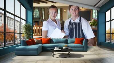 Portrait Of Chef And Waitress In Restaurant Wall mural