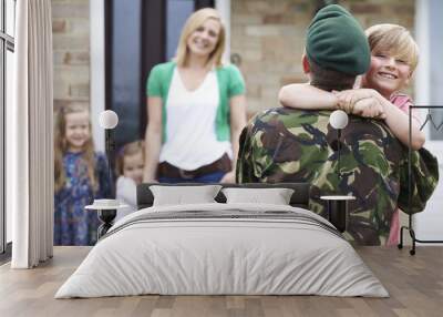 Son Greeting Military Father On Leave At Home Wall mural