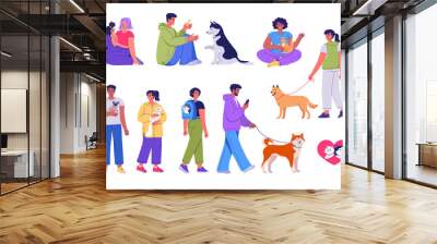 Happy young people playing and walking with their cute pets Wall mural