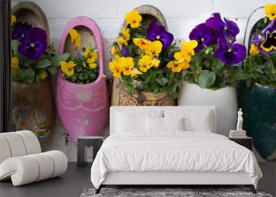 Dutch wooden clogs with flowers Wall mural