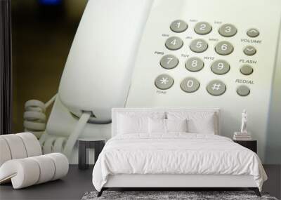 close up soft focus on telephone devices at office desk with light effect,communication technology concept Wall mural