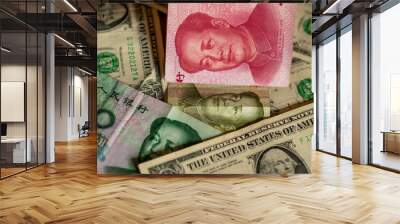 U.S.-China Trade War concept. Chinese Renminbi (yuan) currency banknotes with green US Dollar notes. Illustrates trade, commerce, imports, exports, exchange rates, and trade tensions. Wall mural