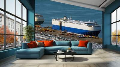 Anchored car carriers and imported cars. Wall mural