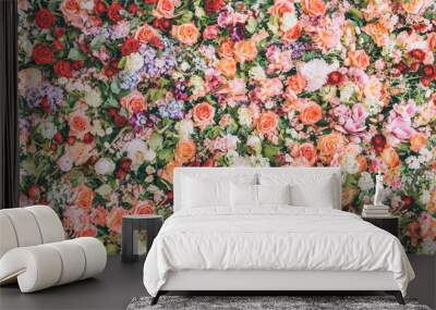 Beautiful floral wall background with fresh rose and flower bouquet pattern. Vintage wedding decoration banner. Wall mural