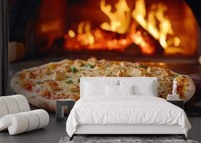 A high-resolution horizontal image of Italian spicy paneer tikka pizza with a thin crust, melted cheese, and a wood-fired oven in the background with vibrant flames.
 Wall mural