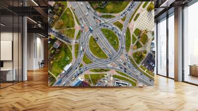 aerial view of road interchange or highway intersection. Junction network of transportation taken by drone. Wall mural