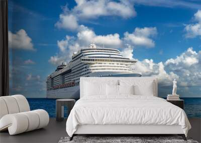 Cruise ship in crystal blue water with blue sky Wall mural