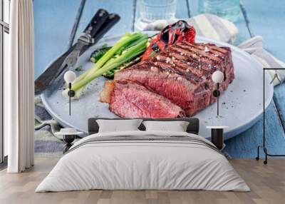 Modern style traditional barbecue dry aged angus sirloin beef steak served with vegetable as close-up on a Nordic design plate Wall mural