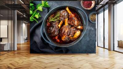 modern style traditional braised slow cooked lamb shank in red wine sauce with shallots and carrots  Wall mural