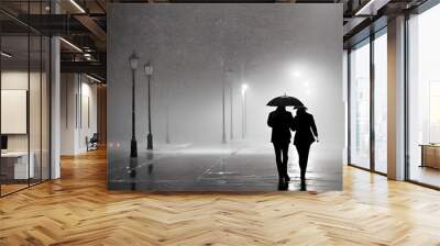 AI generated image of a silhouette of a couple holding umbrellas in the rain at night. Wall mural