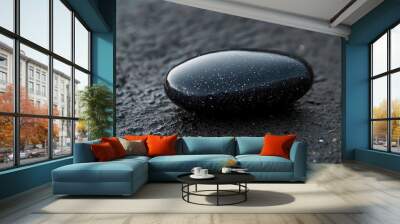 a black stone in the background Wall mural