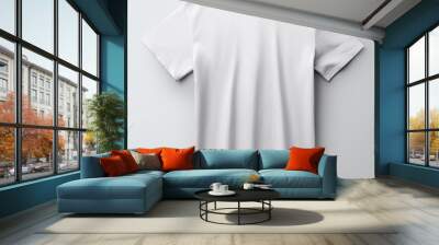 A blank grey t shirt placed on a white background providing ample space for adding images or text Wall mural