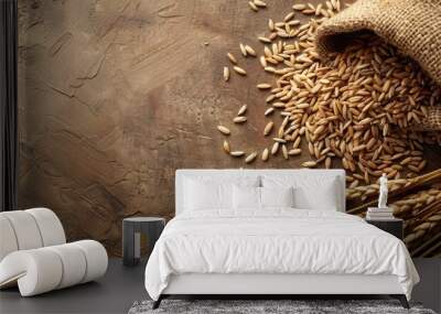 A brown board background with barley rice in the foreground provides both texture and copy space image Wall mural