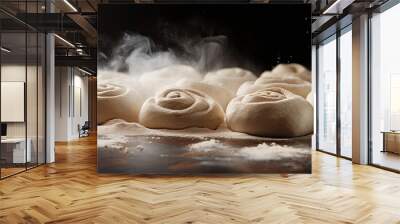 A copy space image featuring the cooking process of raw dough used for Cinnabon cinnamon buns Wall mural