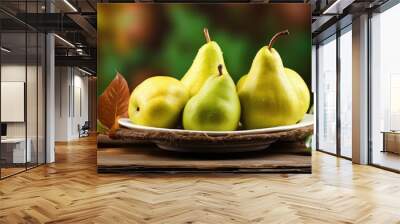 A delicious autumn dessert of ripe pears presented on a vintage wooden plate on the table These sweet fruits are not only a treat but also a healthy option The image provides a perfect space for any Wall mural