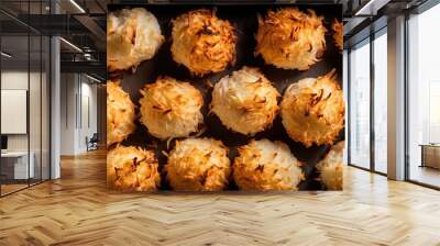 A top view image showcasing delicious homemade coconut macaroons baking in the oven with copy space available Wall mural