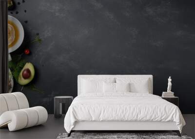 A top view of a healthy breakfast featuring two avocado sandwiches a boiled egg and salmon The meal is served on a gray table with a cup of tea nearby The image depicts an arrangement from overhead Wall mural