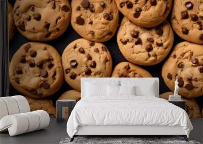 A top view of brown chocolate chip cookies used as a textured background for a copy space image Wall mural