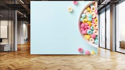 An aerial perspective of a bowl filled with cereal rings and marshmallows creating an appealing copy space image Wall mural